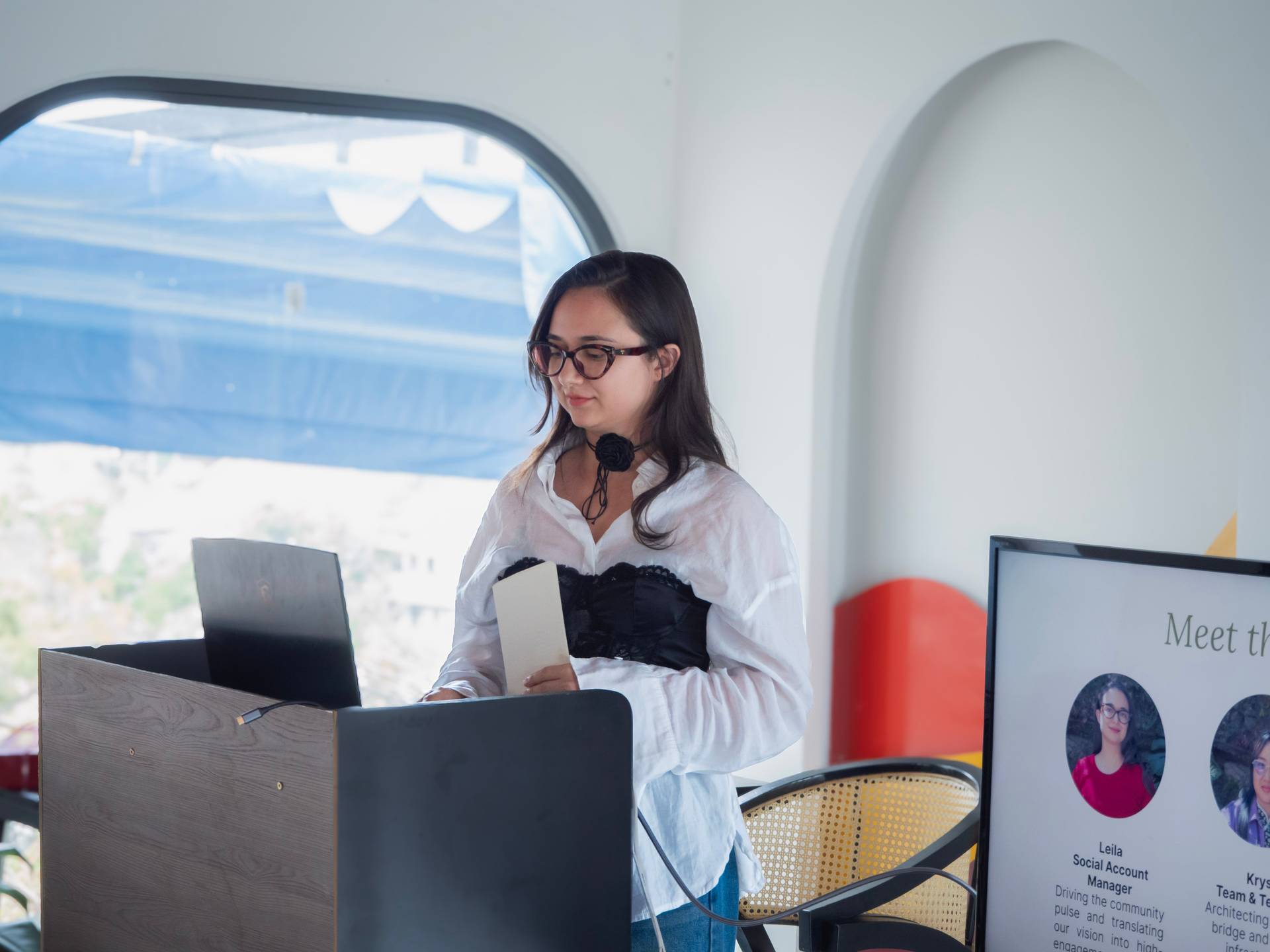 Multiple event attendees gathered in a bright, modern venue in Đà Lạt for a workshop or conference. The spacious interior accommodates a diverse group engaged in learning or networking activities.