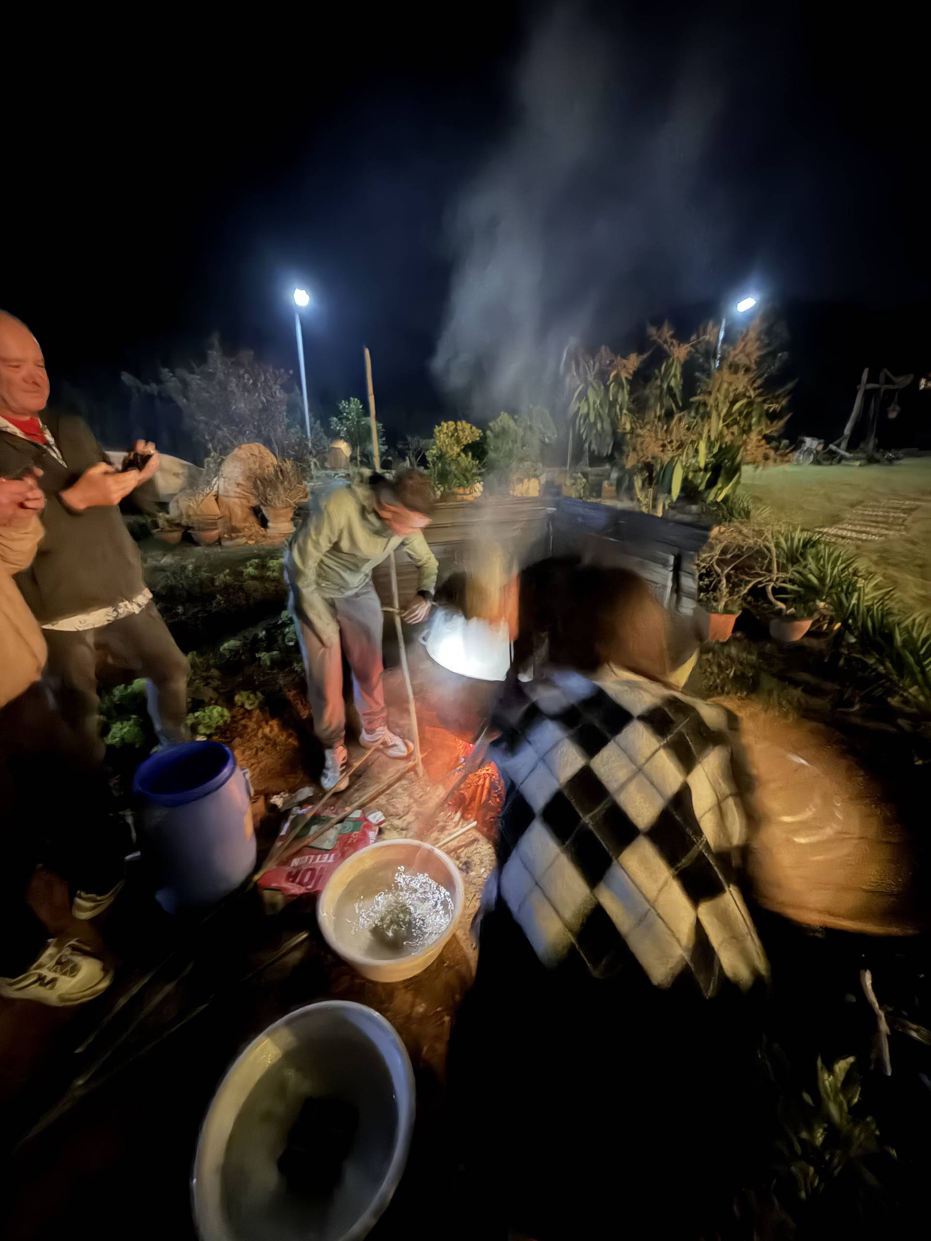 Evening outdoor event in Đà Lạt featuring garden entertainment and community activities in a naturally scenic countryside setting.